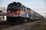 Inbound commuter shoves east out of the station